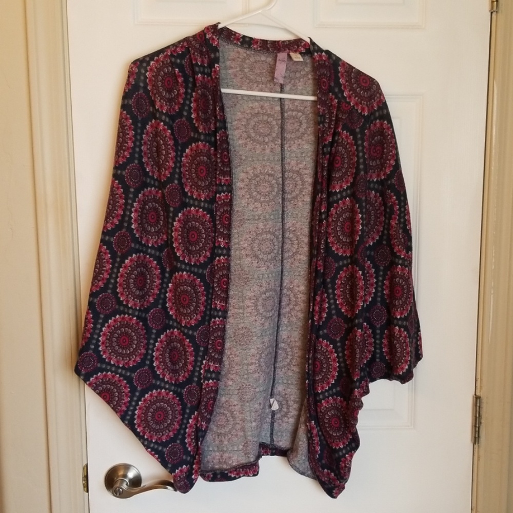 Alta shrug